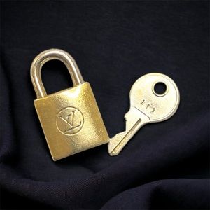 #113 RARE Louis Vuitton Cadenas Lock and Key Set